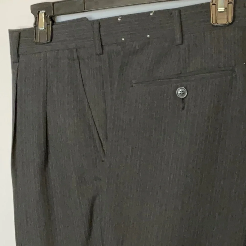 Men’s suit,size 44. Gray with blue and cream threads.